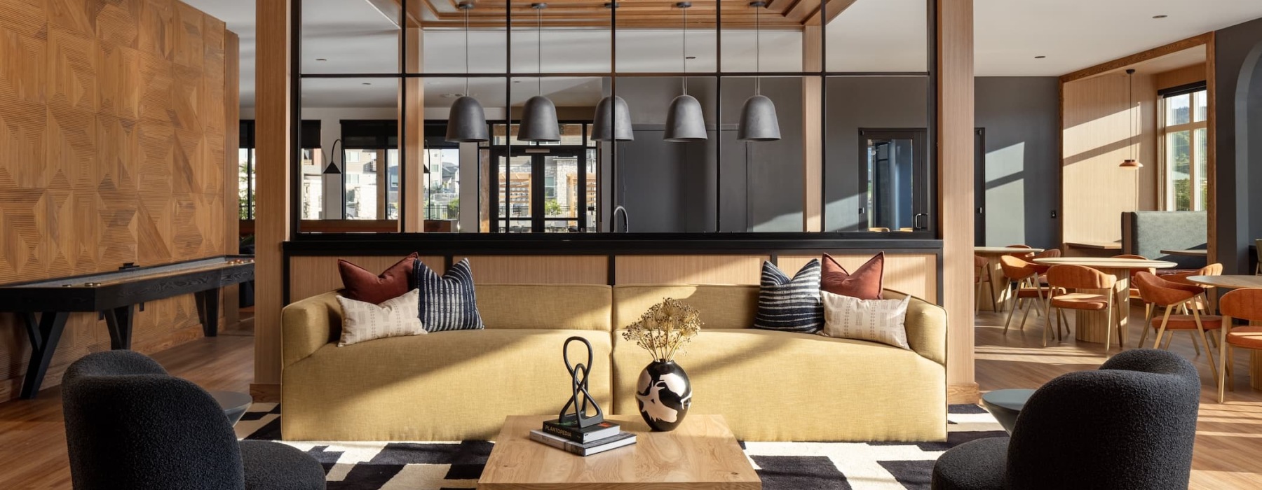 Lounge area with modern decor and ample seating at our apartments in Sterling Ranch.