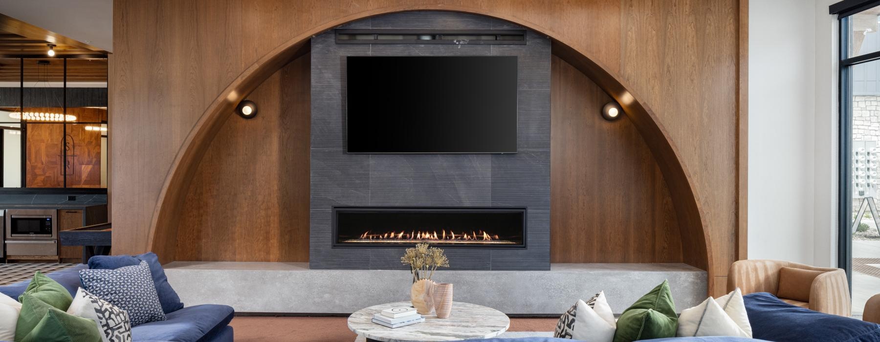 lounge with a fireplace and modern seating